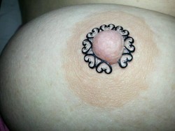 lostbritishsoul:  My nipple ring… Trying