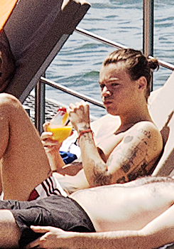 Harry Styles at the hotel pool in Milan, Italy. June 30th, 2014