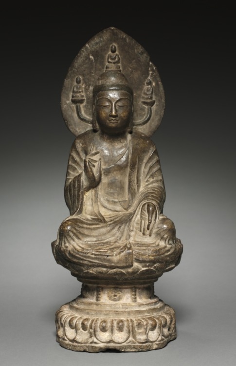 Amida Buddha, 581-618, Cleveland Museum of Art: Chinese ArtThe leaf-shaped halo of this seated Buddh