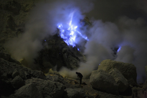 mysticplaces:  Martin Rietze’s photos of the volcano Kawah Ijen in East Java, Indonesia- its sulfer-rich flows and gases rise to temperatures upwards of 600° C, causing the flames to burn a bright, electric blue when viewed at night. photography by