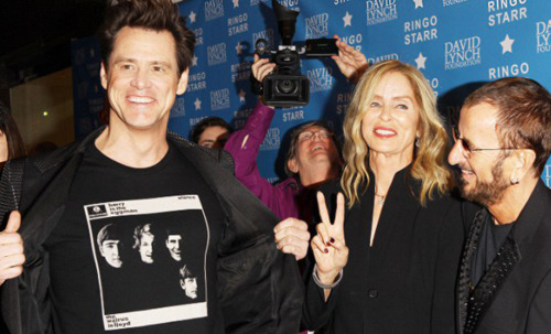 jimcarreying:  Jim Carrey’s shirt, which replaces the faces of George Harrison and Paul McCartney with Lloyd Christmas and Harry Dunne is photobombed by Ringo Starr at the David Lynch Foundation’s Lifetime of Peace & Love Award 