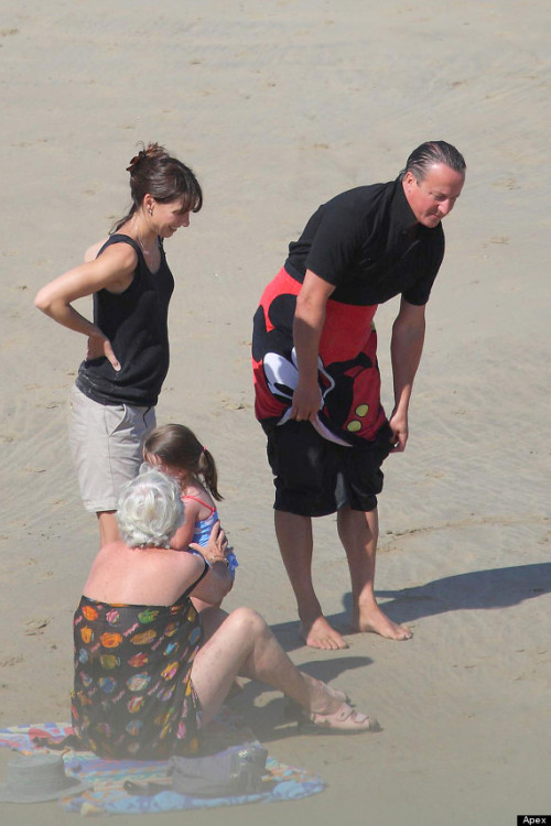 The UK Prime Minister changing his shorts with a mickey towel