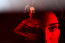 markvelasquez:  Another double exposure with the naturally beautiful Faviana. She is as sweet as she is lovely, a wonderful and easy person to work with. The odd thing is I have used this same red clip-on light and bulb since I began taking photos of