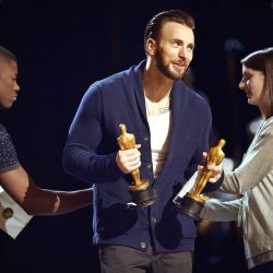 He should wear these clothes always!!! Button down cardigan and a vest, with that sexy ass tattoo peeking out. Lumberjack porn at its finest.