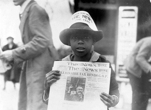 Washington D.C., November 8, 1921, When Republicans Wanted a Tax on the Rich.A young news seller hol