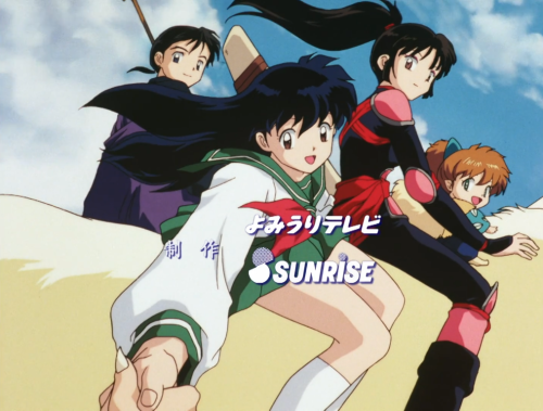 Inugang is smiling to Inuyasha as they are on Kirara's back