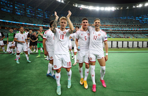 Players of Denmark celebrate their victory after the match vs. Czech Republic