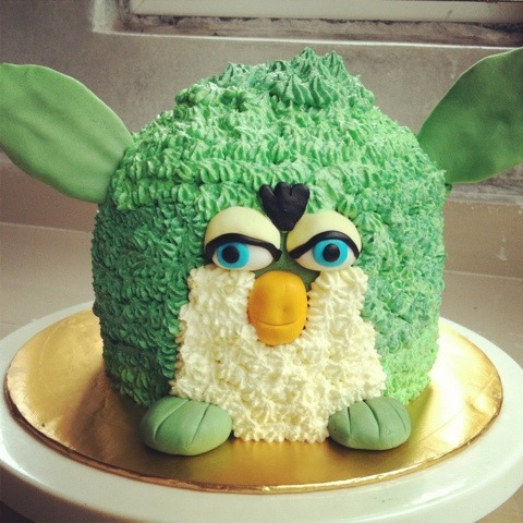 arcadefurbz:  turings:  turings: raw emotion captured through the medium of furby cakes   If u eat 1(one) frosting strand of his fur u will learn ALL the secrets of furby kind. 