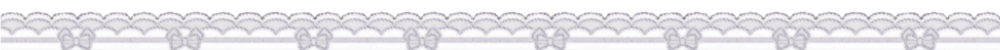 a divider made up of three layers of lace. they're all stacked on top of each other, however ascending in thickness so that you can still see all three layers. the lace is a grey-ish purple that gets darker from the top layer down to the bottom. there's a bow in the middle of the top layer.