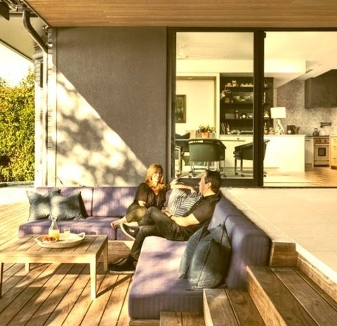 Deck In AustinDeck - Large Contemporary Backyard Deck Idea With A Roof Extension
