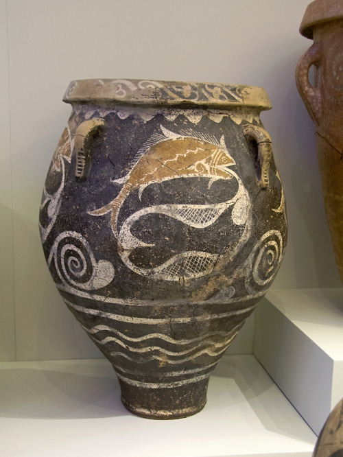 Small Minoan pithos of the Kamares Ware type, depicting fish caught in a net.  Artist unknown; ca. 1