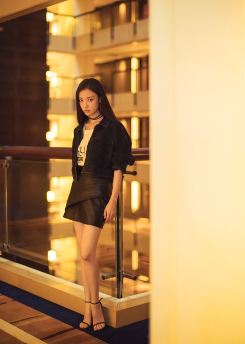 NI NI wearing ALEXANDER WANG jacket and GUCCI tee