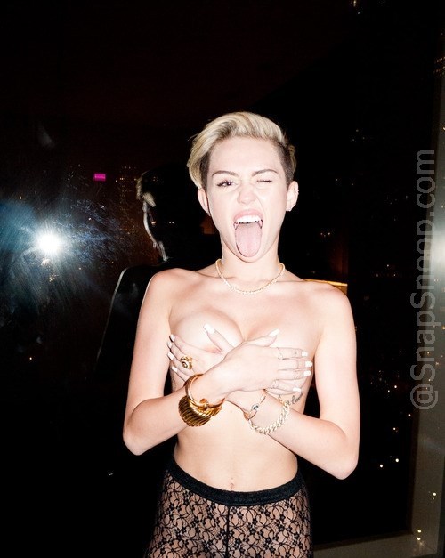 Miley cyrus nip slip in see thru stockings. Camera man should be shot for not stepping back a step o