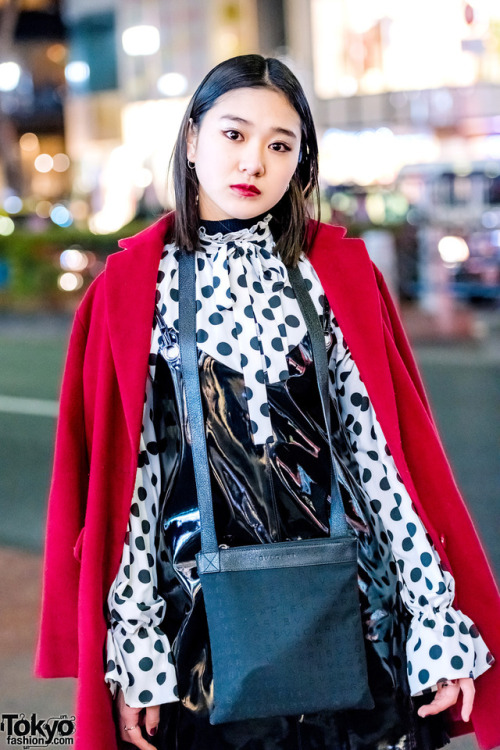16-year-old aspiring Japanese model/actress Manaka on the street in Harajuku wearing a red coat over