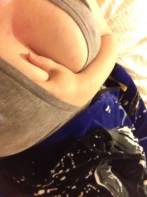 myinnernaughtyside:  Sooo, like most girls when I’m chilling watching tv, my hand will wonder in my shirt and just hold on to one of my lady pillows.  So sexy babygirl!