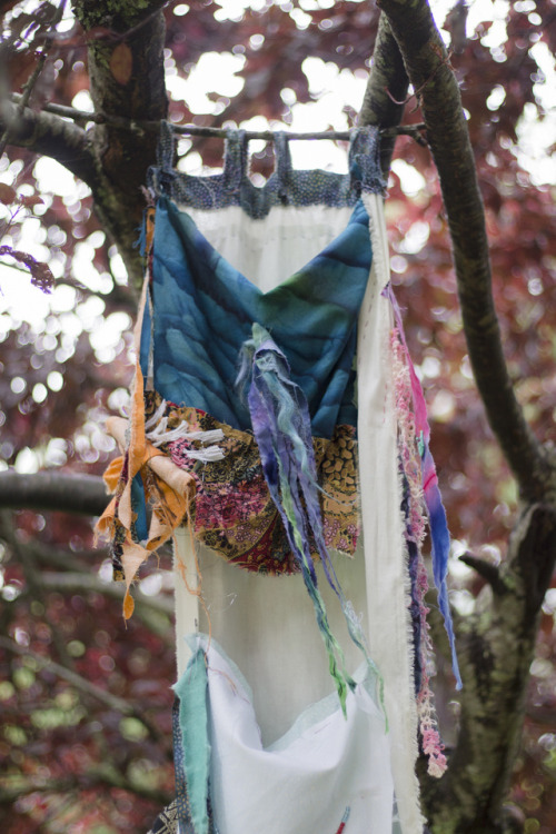 Montessor Dream Scroll hung in the school cherry tree. Photo credit Shawna Caldwell