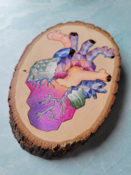 Color Me With LifeGeometric heart, woodburning with vibrant colors. By Megan (unstrungstudios). Foll