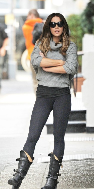 Kate Beckinsale looking amazing in leggings, boots and a sweater. This legs, that ass, the total pac