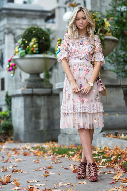 Liz wearing  Floral embroidered by Needle & Thread IG: LateAfternoon