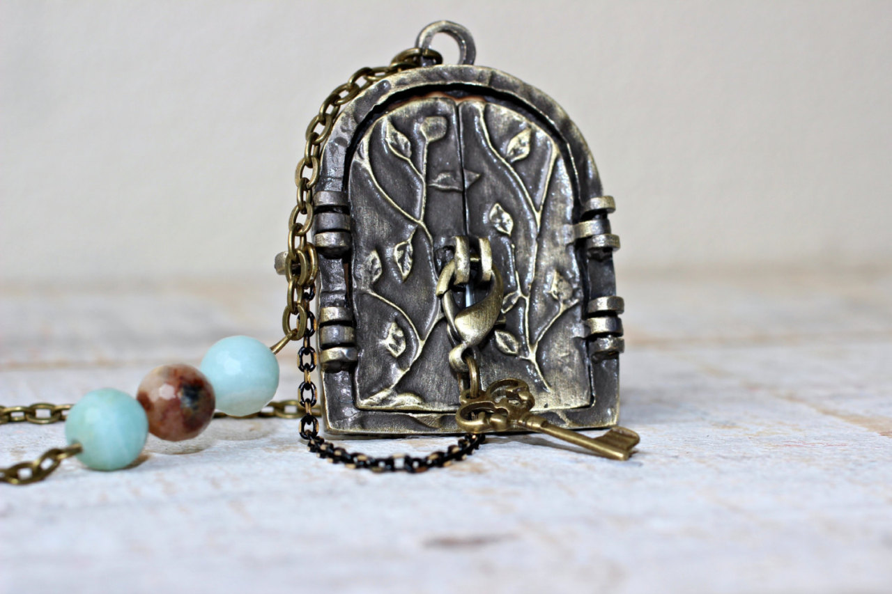 wickedclothes:  Secret Door Locket Necklace Crafted out of antiqued bronze, this