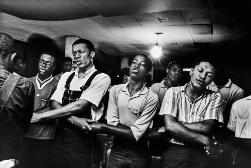 kvetchlandia: Steve Schapiro     Civil Rights Workers Singing “We Shall Overcome” in Storefront, Jac