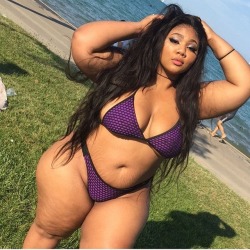 Love how this purple bikini shows off her big thighs