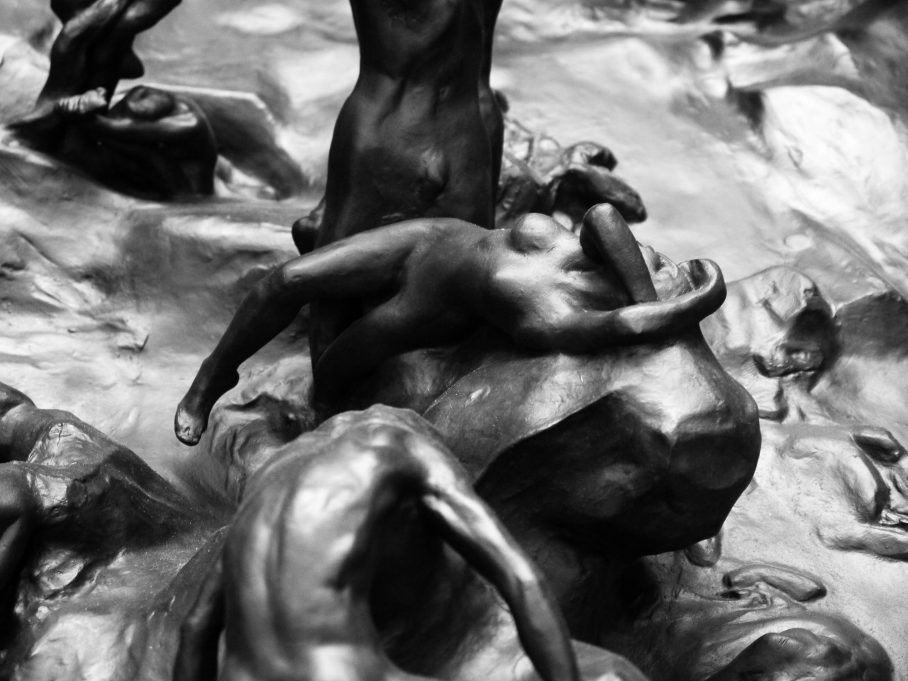 outerground:  Details from the Gates of Hell by Rodin..Bronze doors originally commissioned