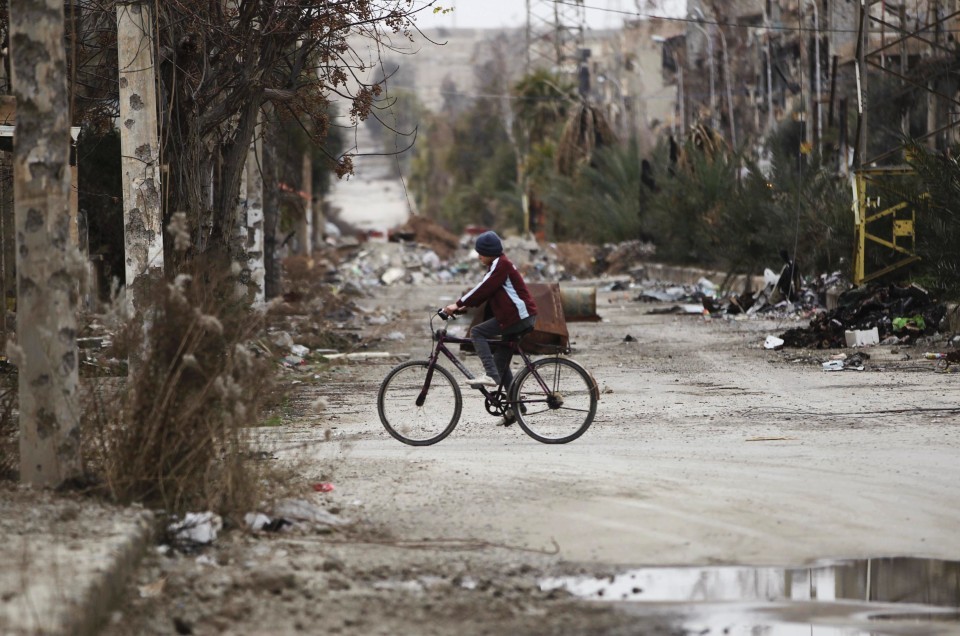 fotojournalismus:  Syria 2014 1. Deir al-Zor, Feb. 3. (Khalil Ashawi/Reuters) 2.