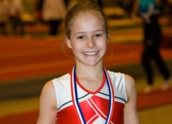 annarodionova:  RIP Milia van de Mortel: A young Dutch gymnast who was killed in the Malaysia Airlines Flight 17 crash. Her parents were both killed as well.  Gone far too soon