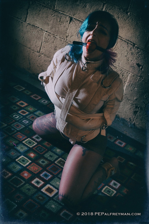 pepalfreyman:@wickeddwillow struggles to escape my new custom straitjacket from @straitjacketshop