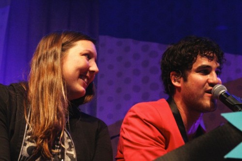 Darren Criss with a fan on stage in concert at The Fillmore in San Francisco, CA