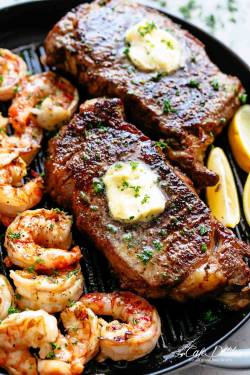 foodffs:  garlic butter grilled steak &amp; shrimp Follow for recipes Is this how you roll? 