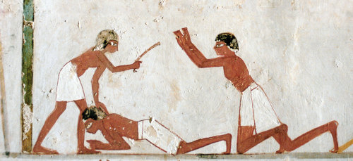 Tax Collectors in Ancient EgyptOfficials beat a man with sticks, probably for failing to fulfill his