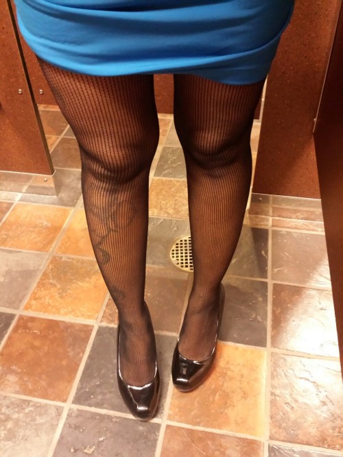 Sw33tmilfladi:  I snuck off to the bathroom. :-)  Selfshot in black fasion fishnet pantyhose in the 