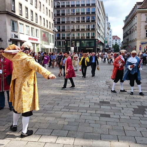 Curiously dressed #footmen outside the #StephansDom #cathedral in #Vienna #Austria plying their trad