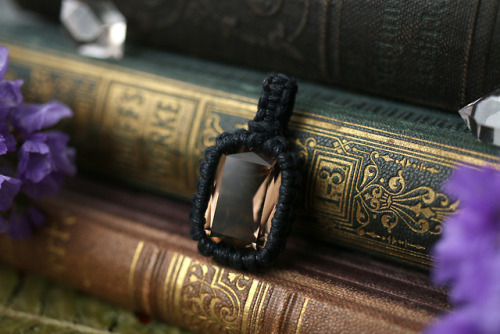 Amethyst, faceted smoky quartz and orthoceras fossil macrame pendants made with black cotton yarn. A