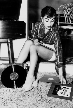 vintagegal:  Audrey Hepburn playing records, 1953 