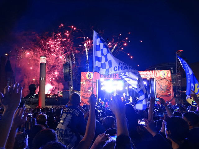 blue-madness-blue:  Cardiff City fans cheer their team on a day of sunshine celebrations