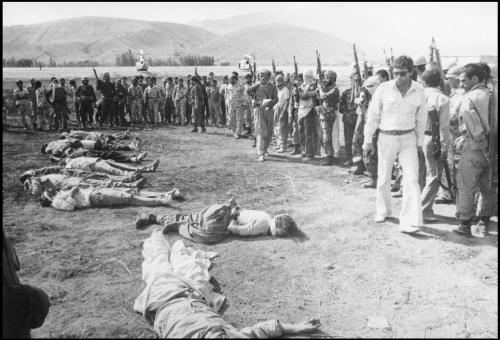 chasing-rose:  The Pulitzer Prize winner photographs, Iranian revolutionary guards executing Kurds. The 11 men were executed on august 27, 1979 at the Sanadaj Airport. (Last Photograph) Among the 11 people executed at Sanandaj Airport was this injured