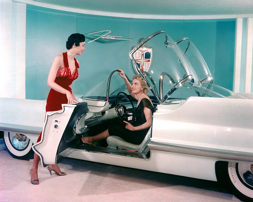 20th-century-man:  Models with the Lincoln Futura concept car, 1955. The Futura would