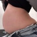 stuffingbelly:This is probably my biggest belly ever. Today I went to McDonald’s with some friends and I decided to stuff my belly to the max. So I ate 6 nuggets, 2 cheeseburgers, large fries, a large coke and a milkshake. After all this food my belly