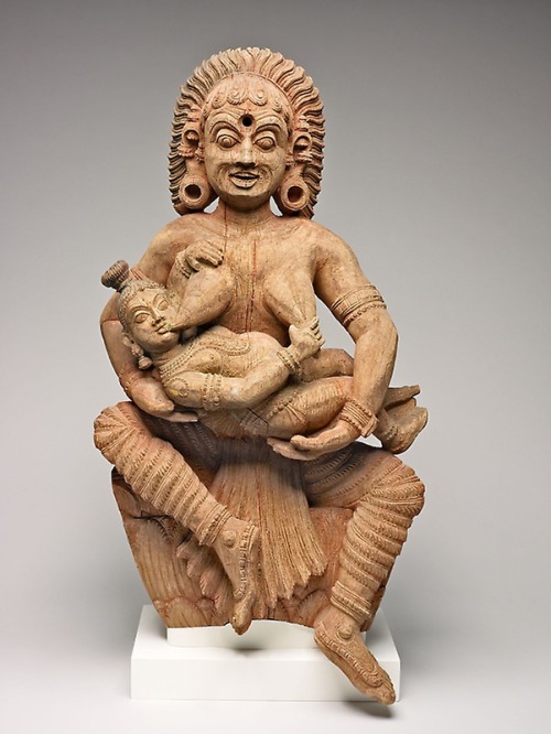 Krishna and demoness Putana, Kerala woodcarving