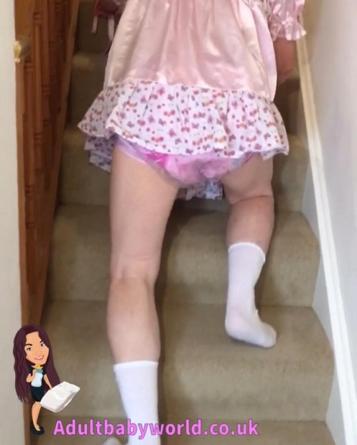 #ABDL #sissybaby Rachel climbing up the stairs in her #sissydress & pink #adultdiaper & nois