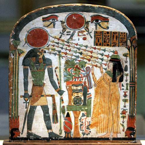 Painted wood funerary stele of an ancient Egyptian noblewoman named Taperet, showing her worshiping 