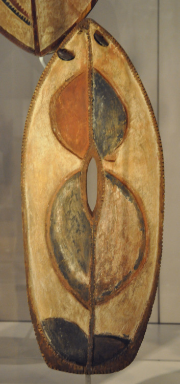 Dance shield (ndomi) of the Kikuyu people, Kenya.  Artist unknown; early 20th century.  Now in the B