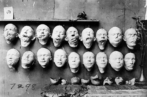 Masks showing the work done by Anna Coleman Ladd of the American Red Cross for WWI soldiers. The top row are casts taken from soldiers’ mutilated faces, the bottom row shows masks of their faces before their injuries, made from pre-war photographs.