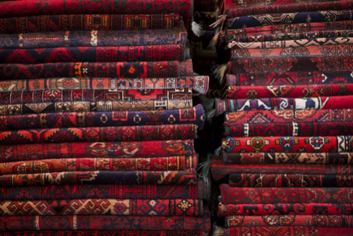 salamalaikum: Carpets and rugs sold by vendor on Chicken Street in Kabul. AJ WILHELM