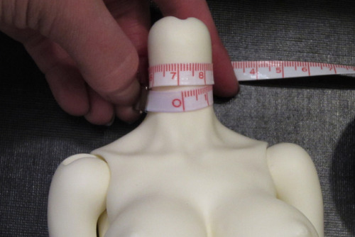 The Before and After of my Dollzone Ro project.  Her unaltered head an neck measurements and the res
