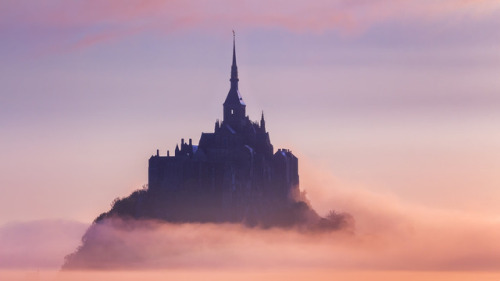 te5seract:    Castle in the clouds  Mont Saint-Michel in the morning mist…  View of famous Le Mont Saint-Michel  by  Liubomir Paut