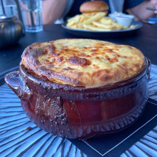 Traditional Greek ‘moussaka’ with potato, eggplant, minced beef, mornay sauce.Athens GR@sofitela